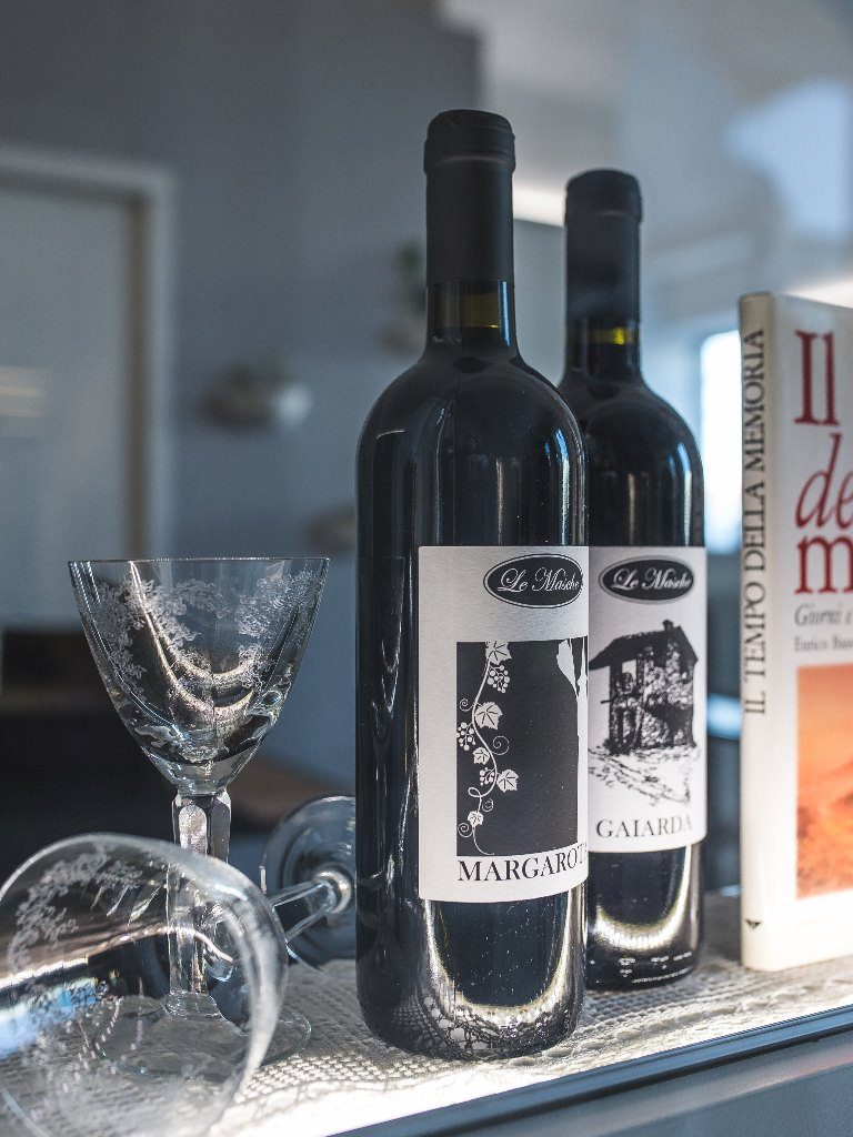 Bottiglie della carta vini di Goustò